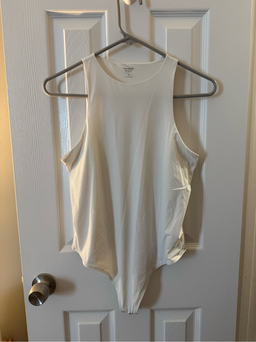 Express Cream High-Neck Sleeveless Bodysuit